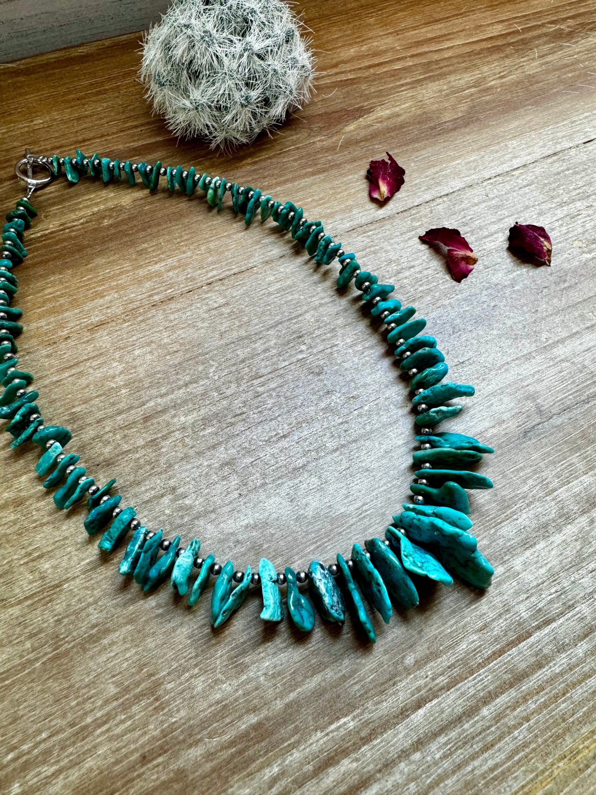 Turquoise necklace (02705AA8) with cactus and petals.