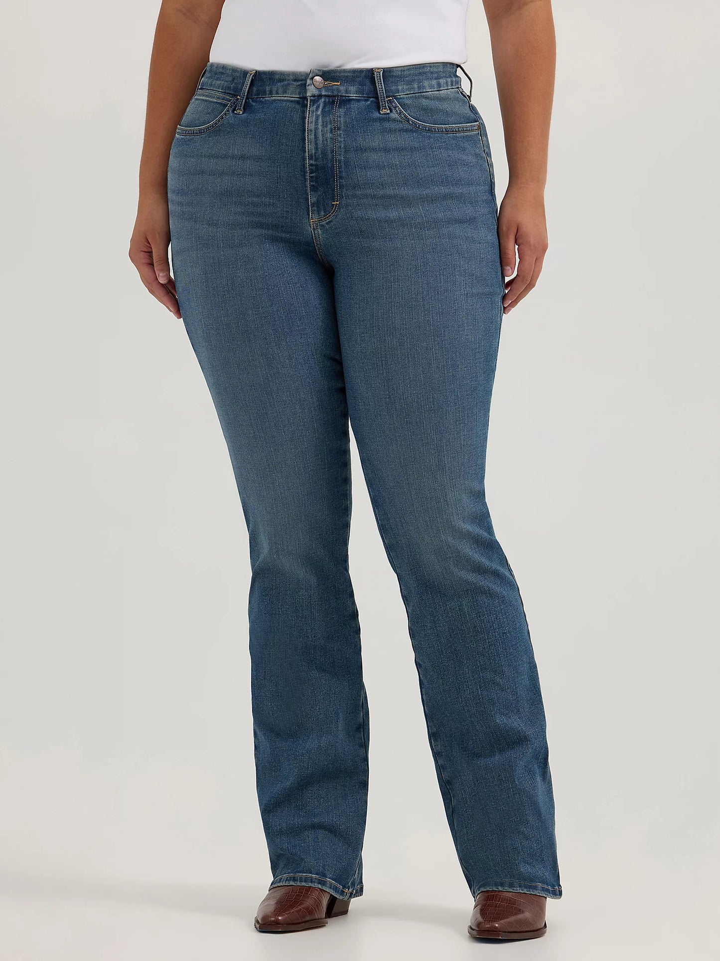 Woman in blue jeans.