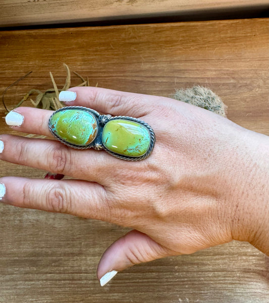 Turquoise ring on hand