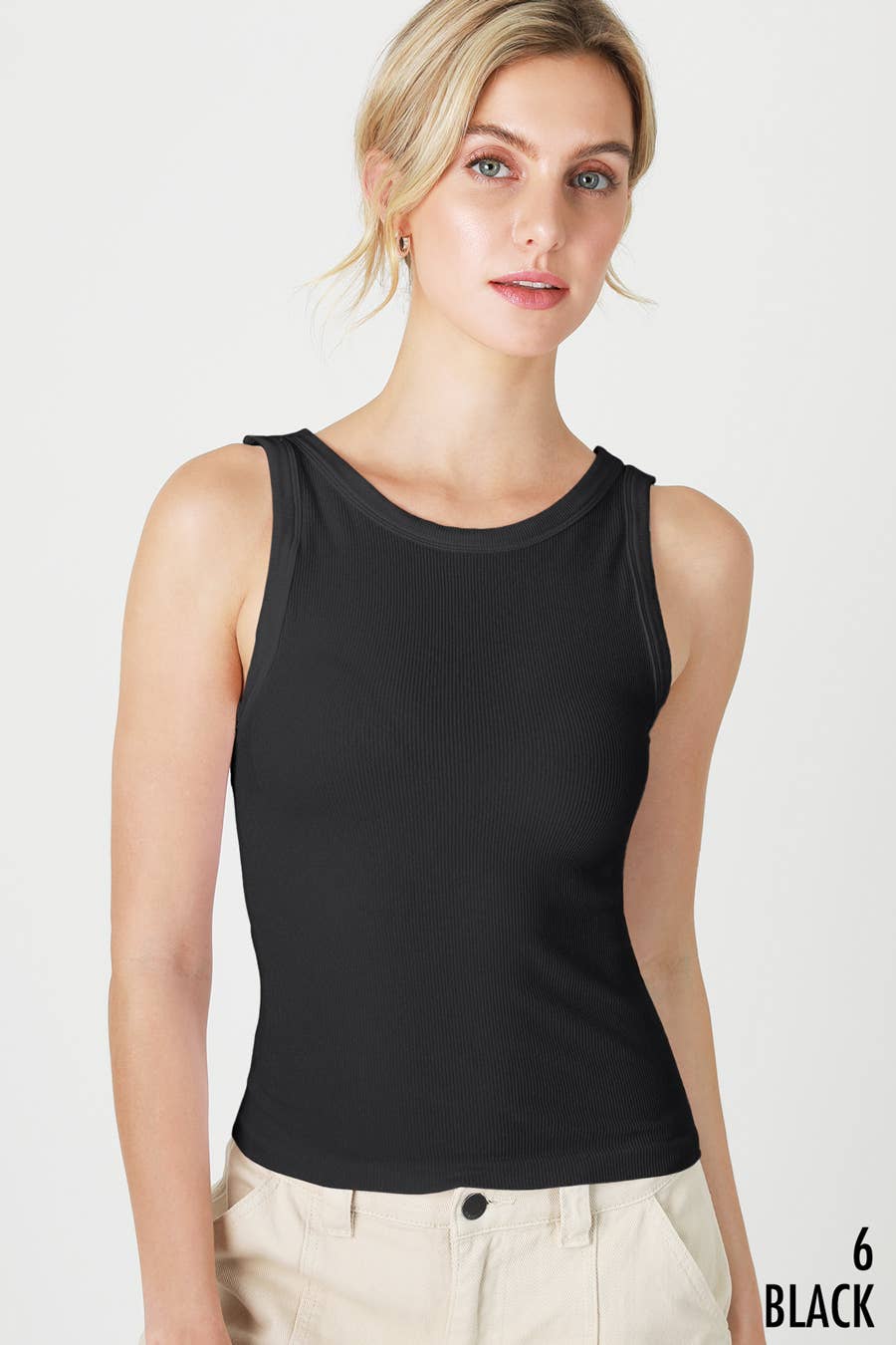 Woman wearing a black tank top.