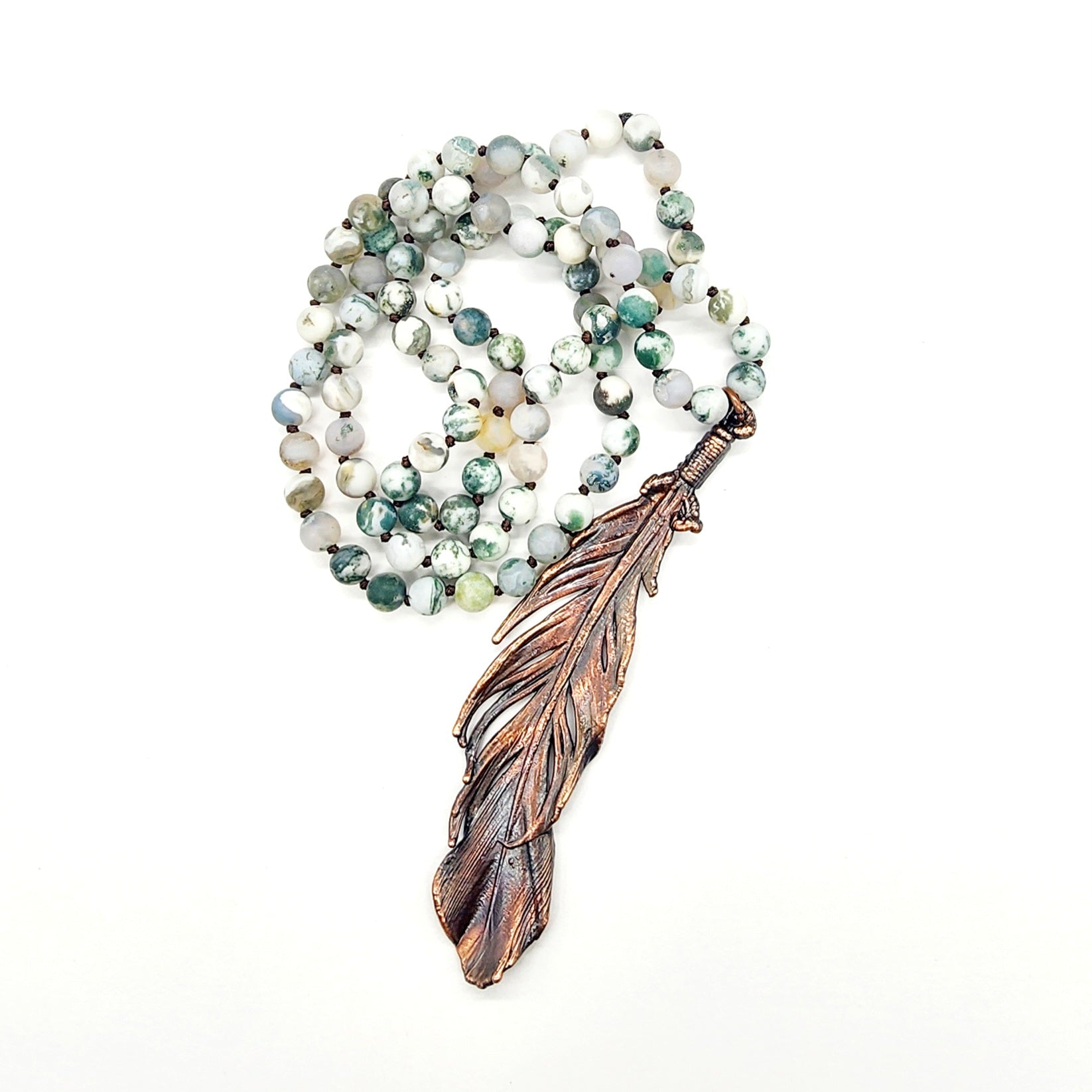 Beaded necklace with feather pendant.