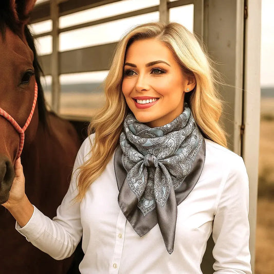 Woman with horse wearing silk scarf