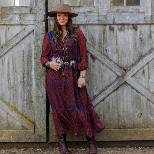 Woman in boho style dress and hat