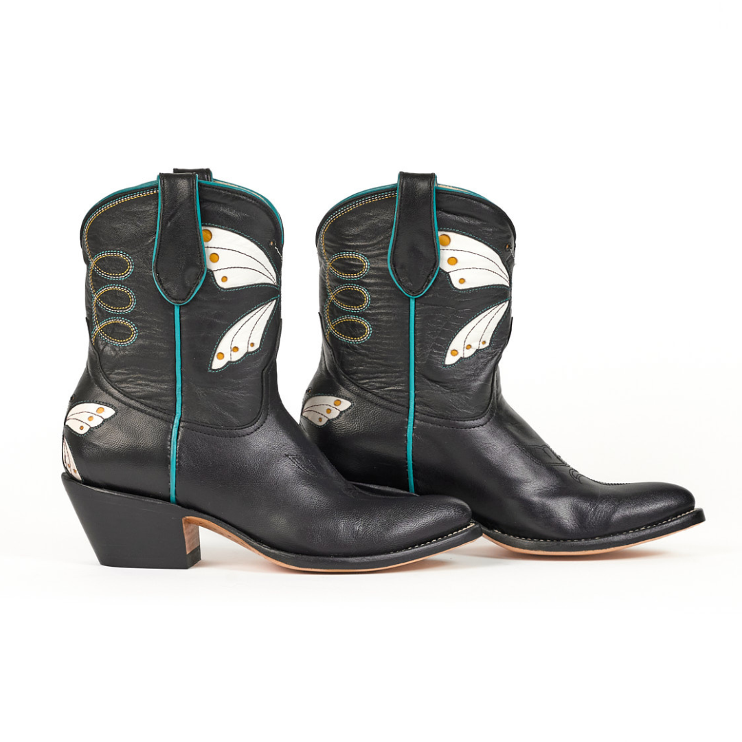Black leather cowboy boots with wing design