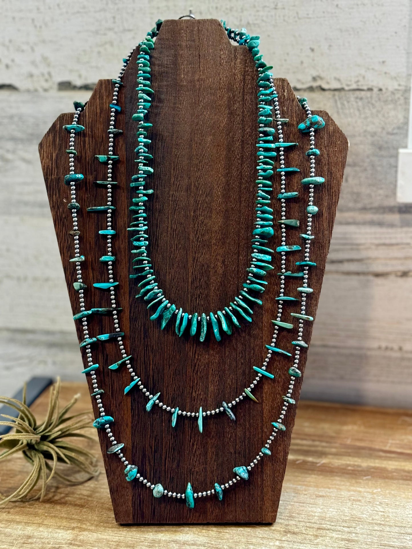 Turquoise necklaces on display - 44E2B66E