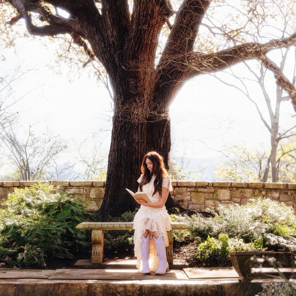Woman reading under a tree, 4_3dc77c1e-6e73-4ace-9855-e727c993a72b