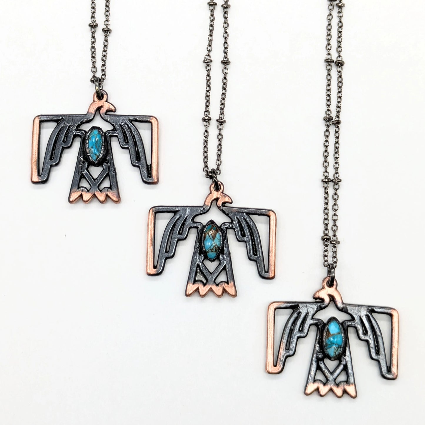 Thunderbird necklaces with turquoise stone