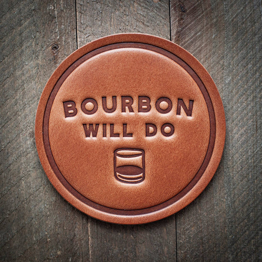 Brown leather coaster with Bourbon Will Do text.