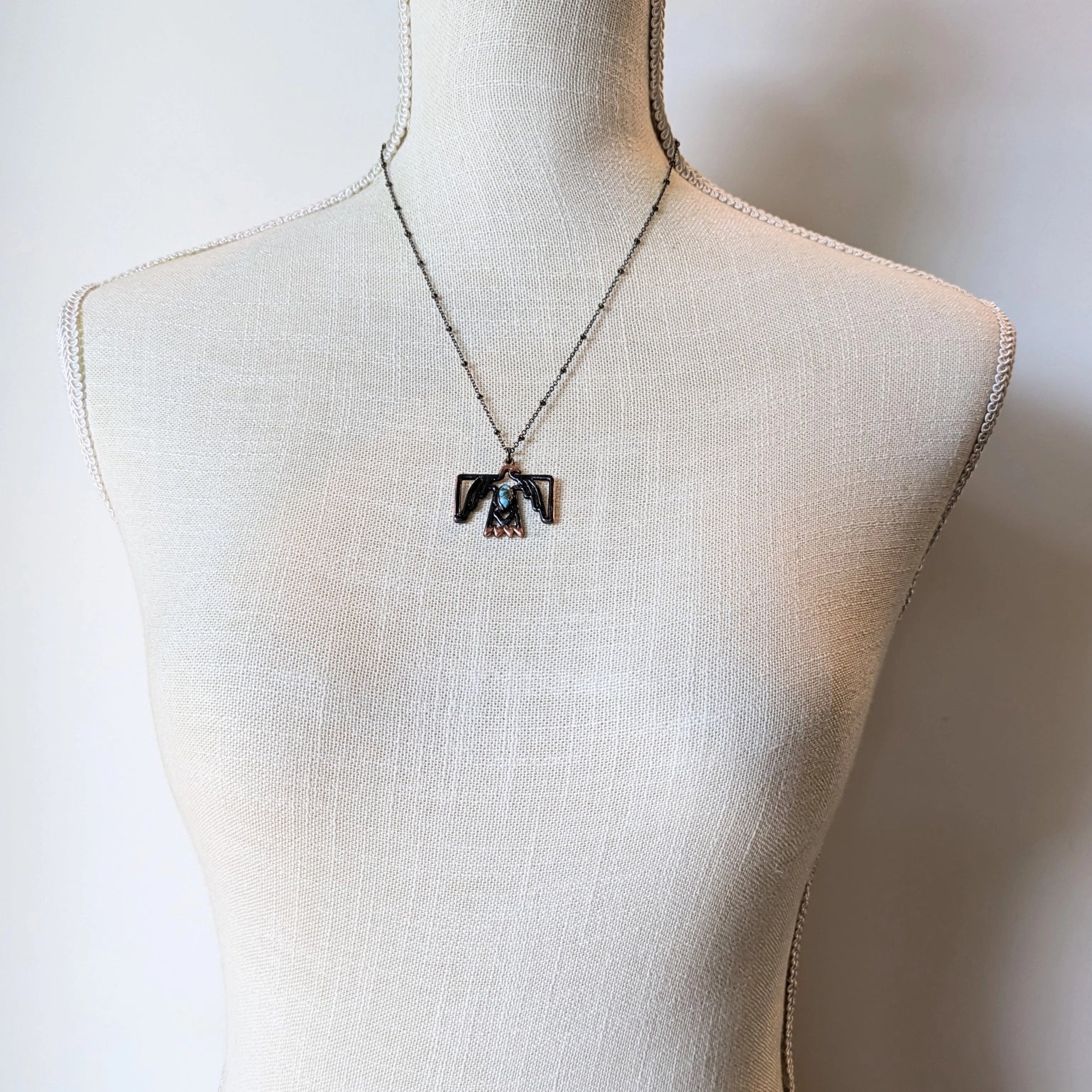 Necklace on mannequin -...