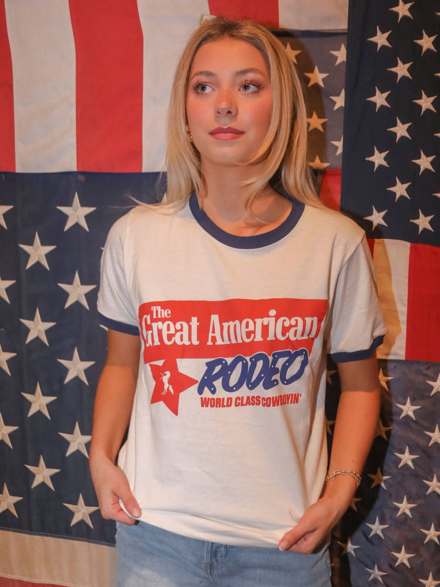 Woman wearing a Great American Rodeo t-shirt.