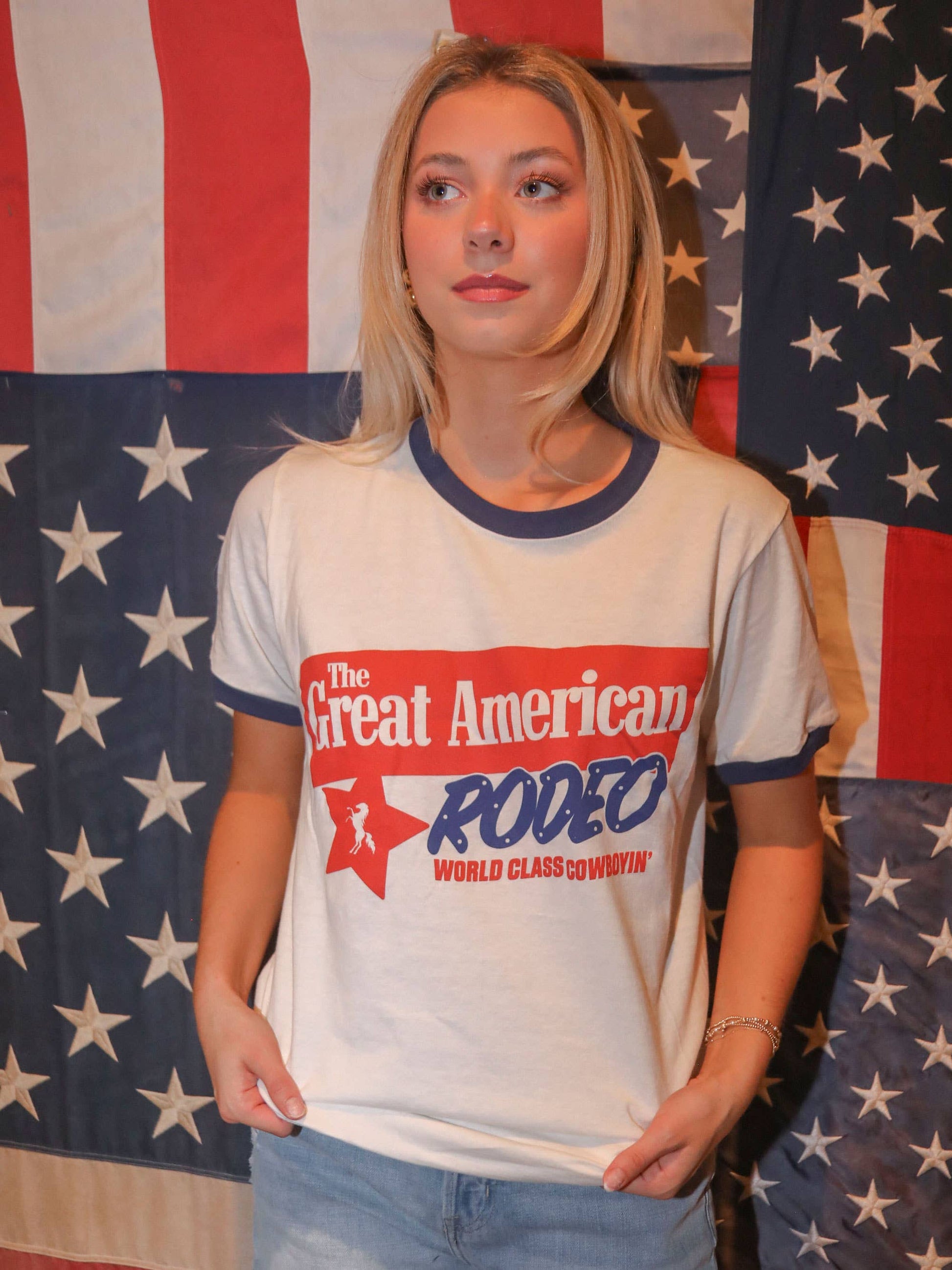 Woman wearing a Great American Rodeo t-shirt.