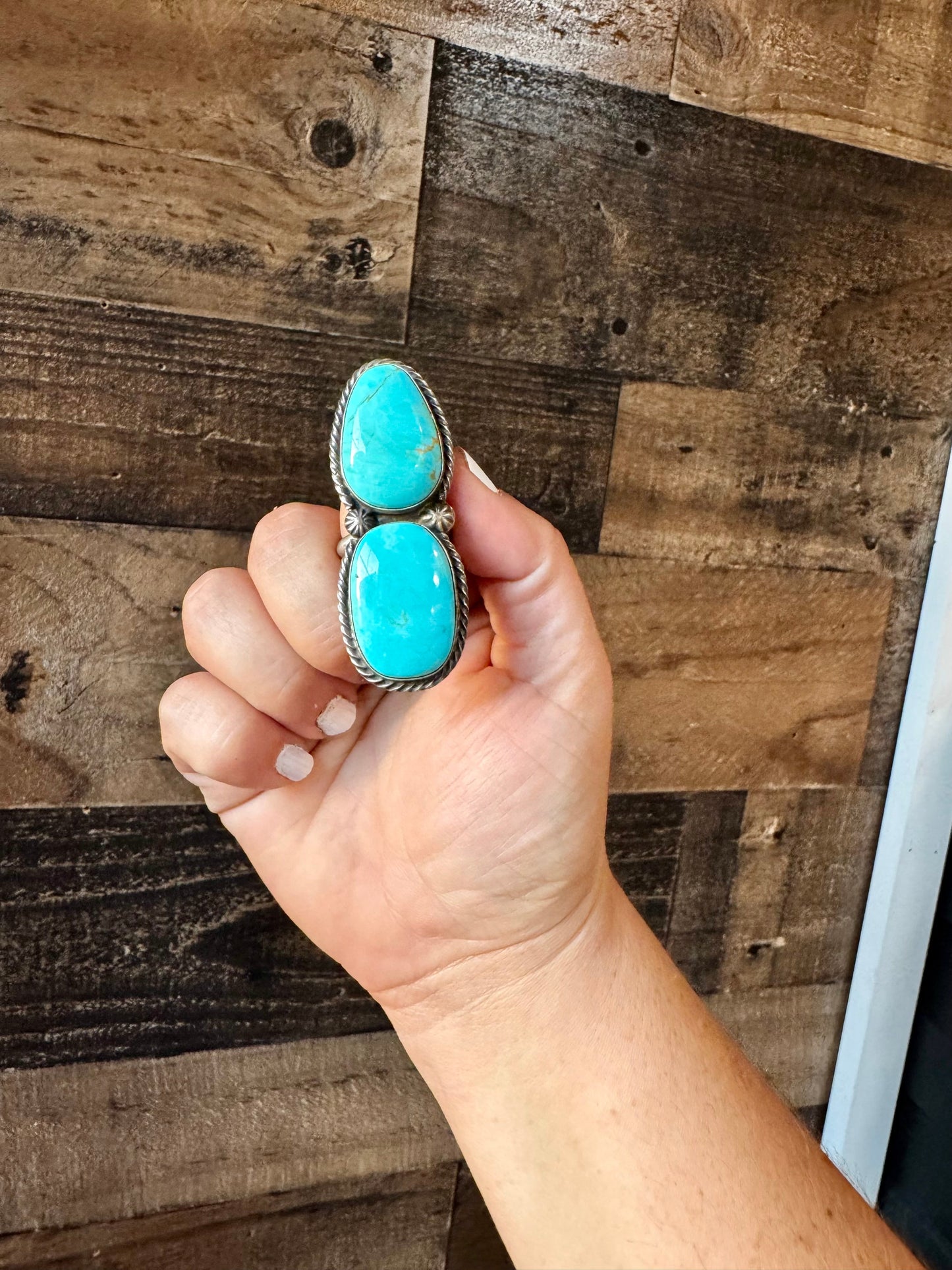 Turquoise ring on hand - 6D4FBB87-7419-4F09-8D25-0F031D882A79