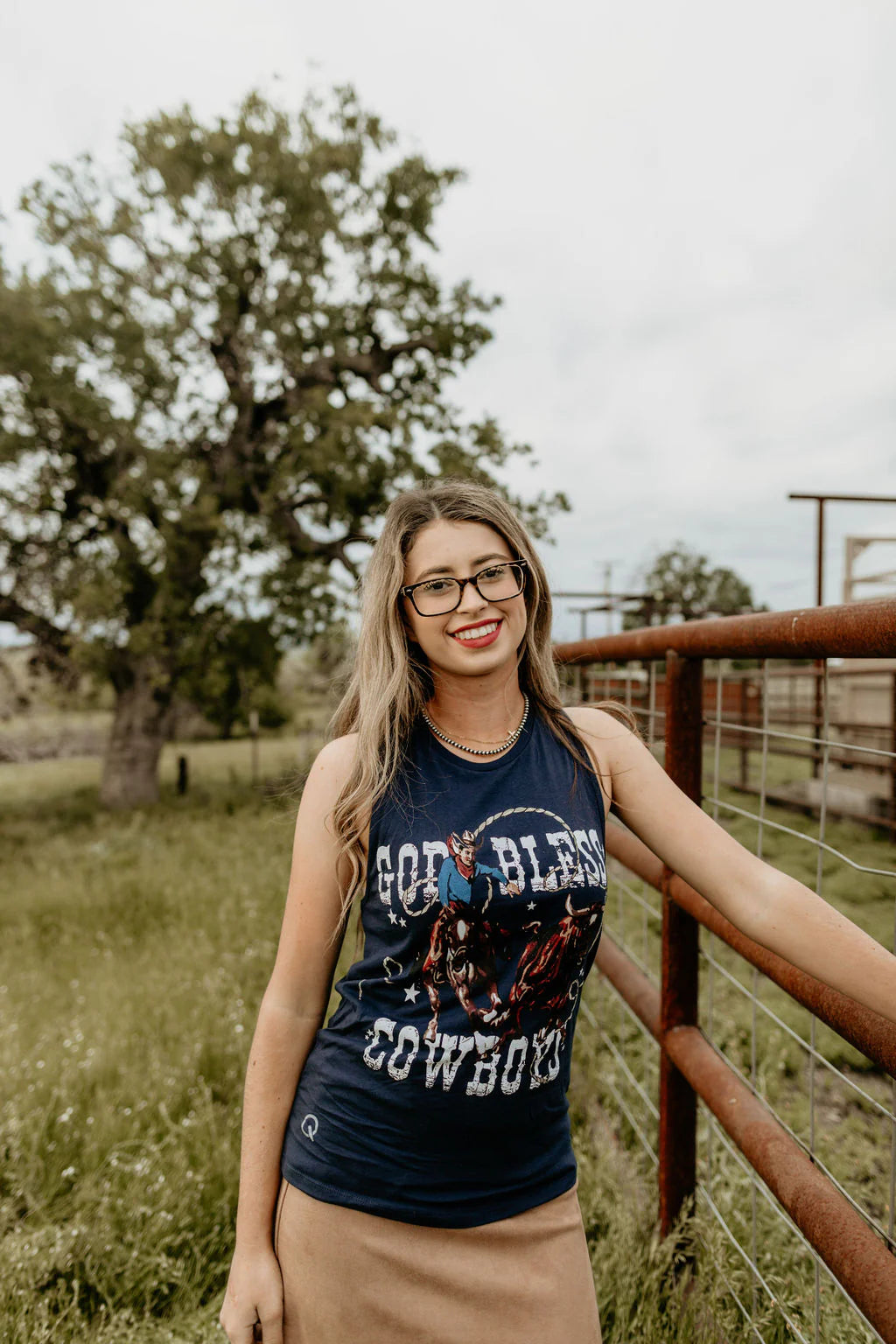 Woman in God Bless Cowboys tank top, 8L5A9570_1.jpg