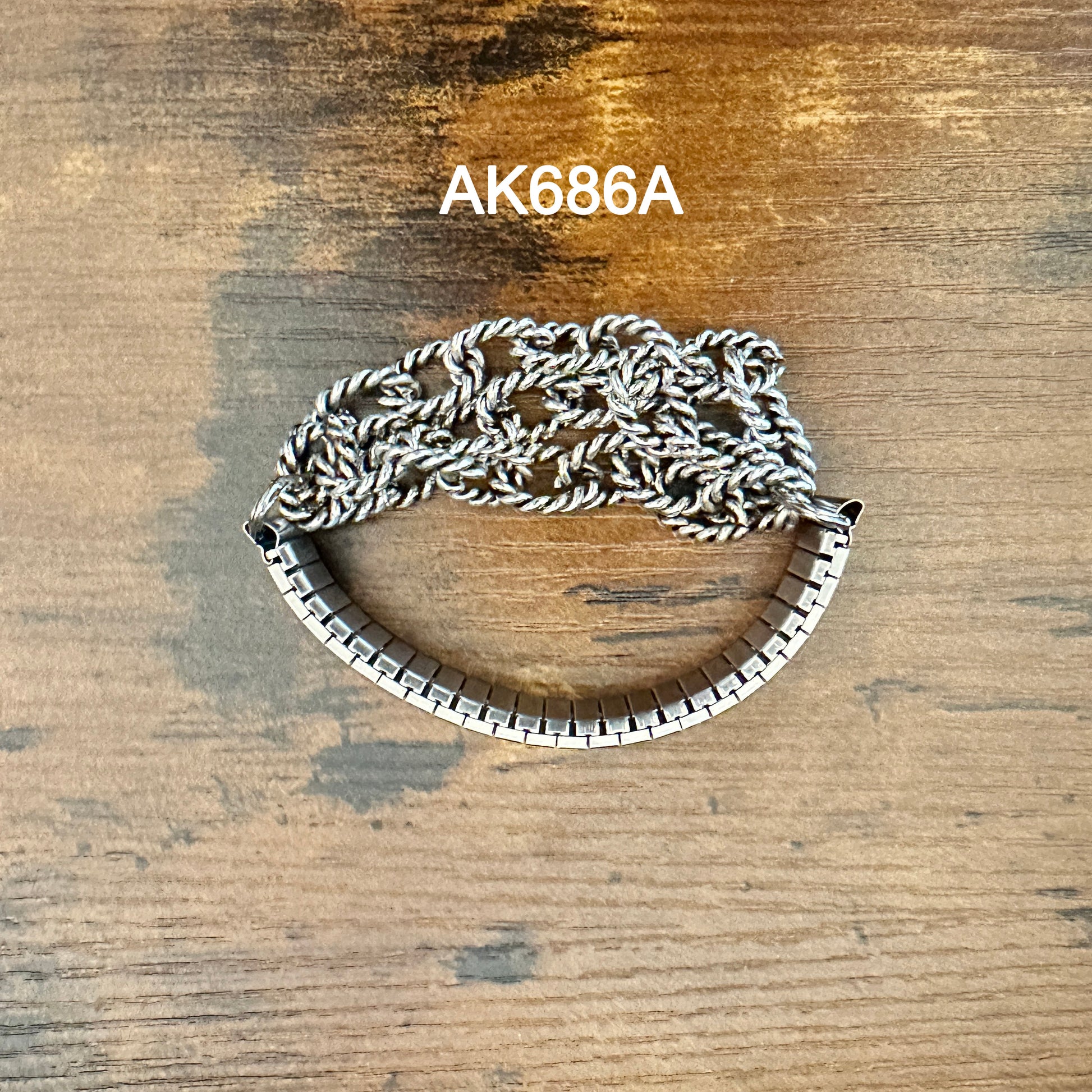 AK686A Silver Bracelet on Wood