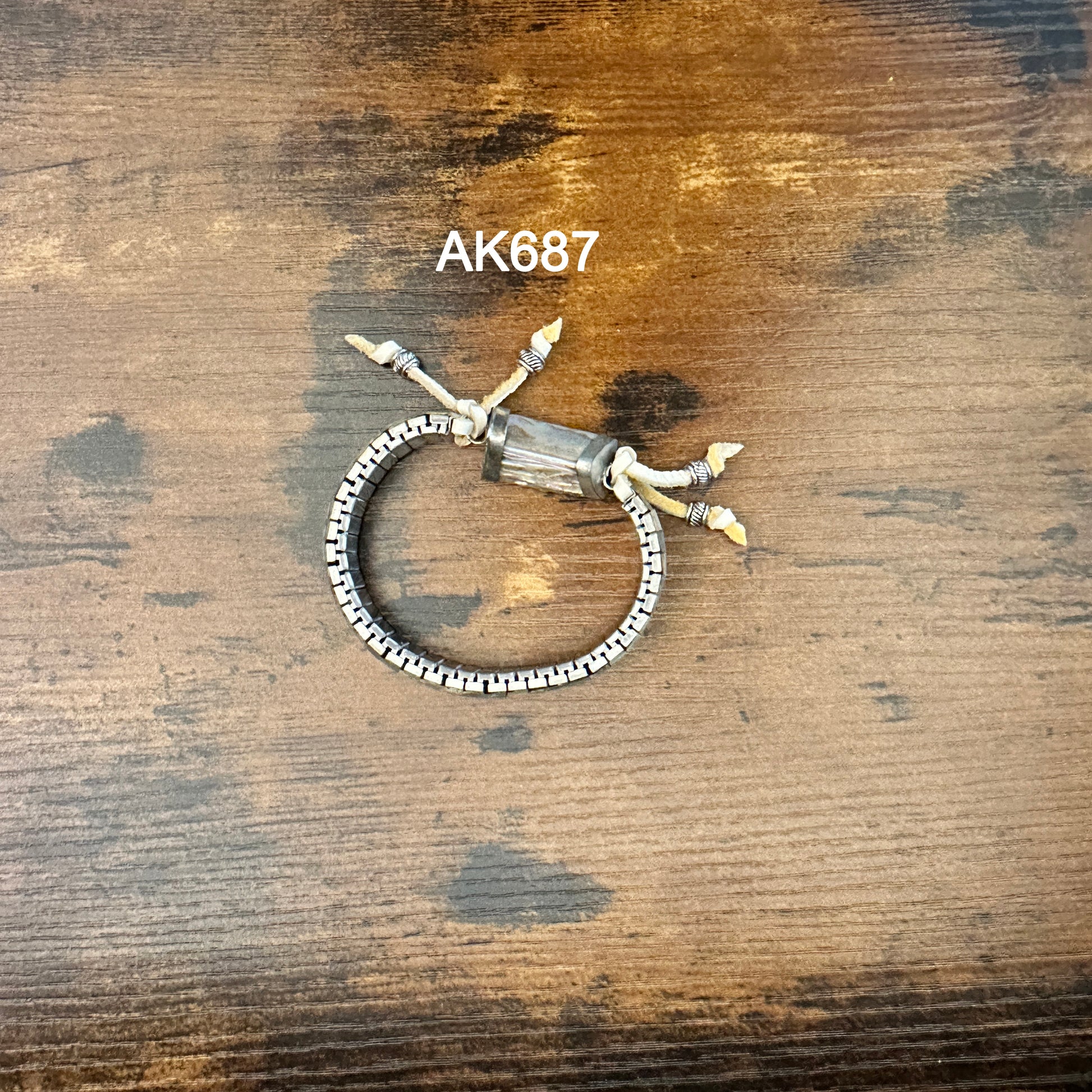 AK687 Silver Bracelet with Decorative Figure on Wood