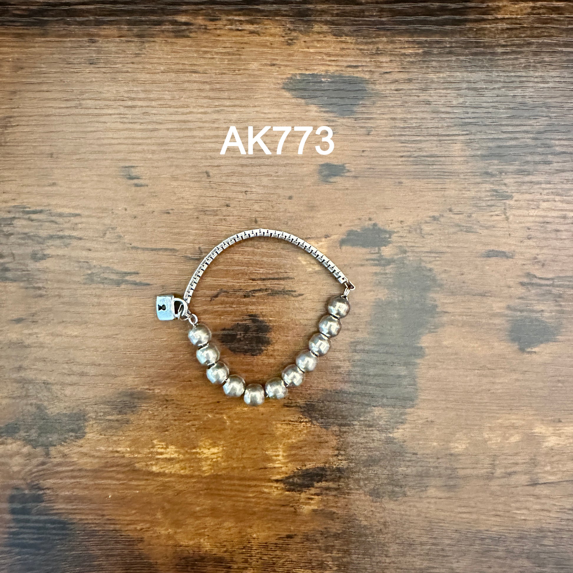 AK773 beaded bracelet on wood