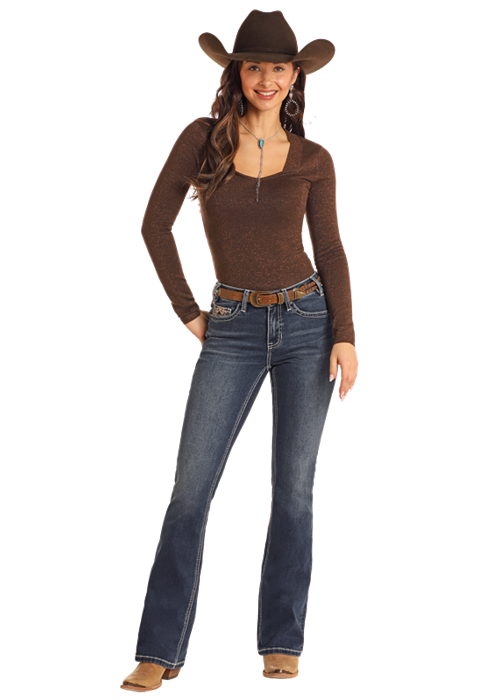 Cowgirl in brown shirt and jeans