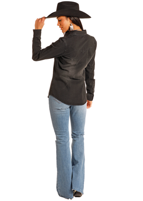 Woman in black shirt, jeans, and cowboy hat. BWN2S03703---B.