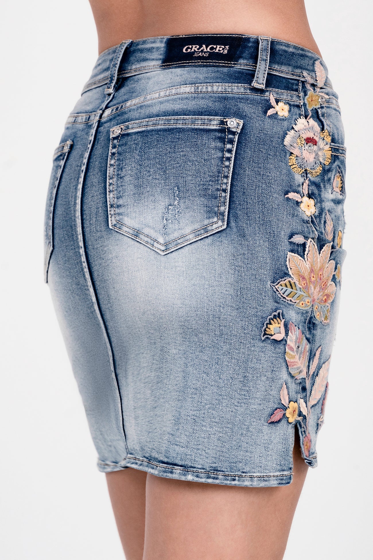 Blue denim skirt with floral embroidery