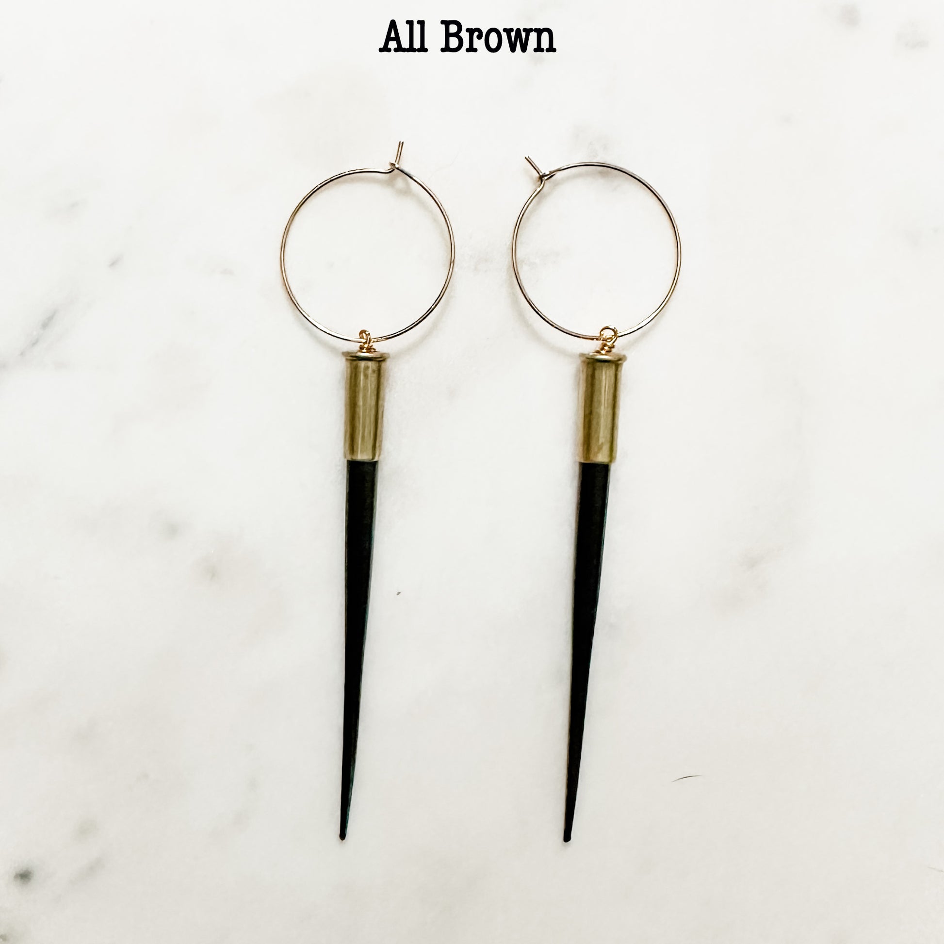 Brown spike earrings