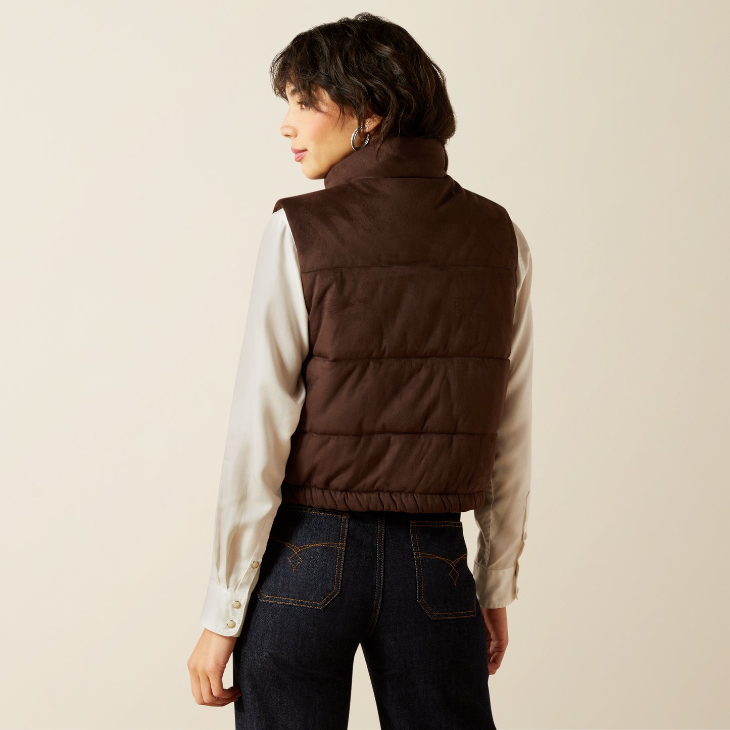 Brown vest, back view, warm style.