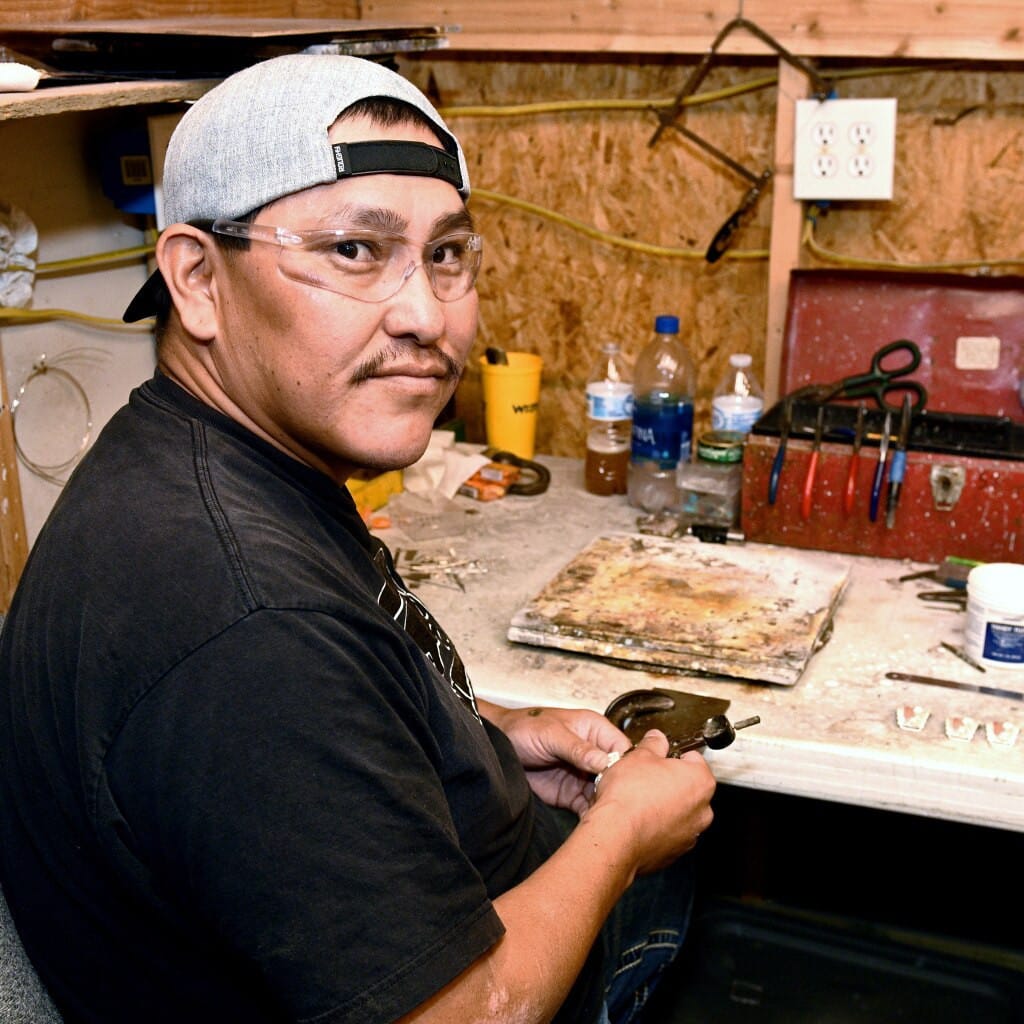 Garrison Boyd working on jewelry