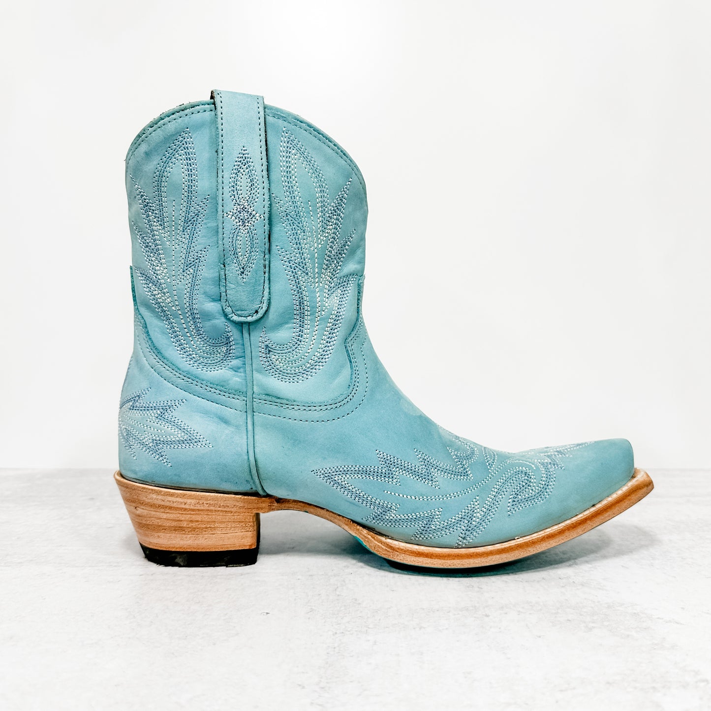 Light blue cowboy boot.
