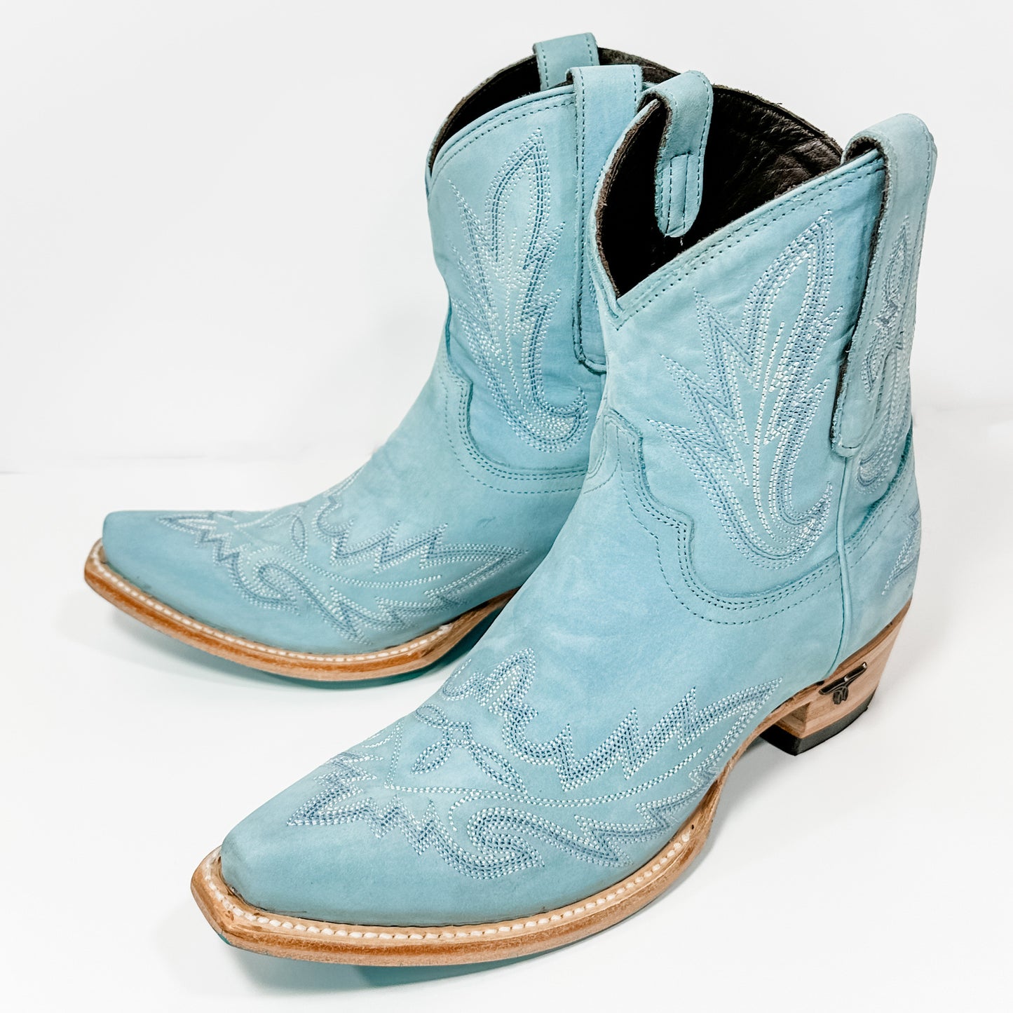 Light blue cowboy boots.