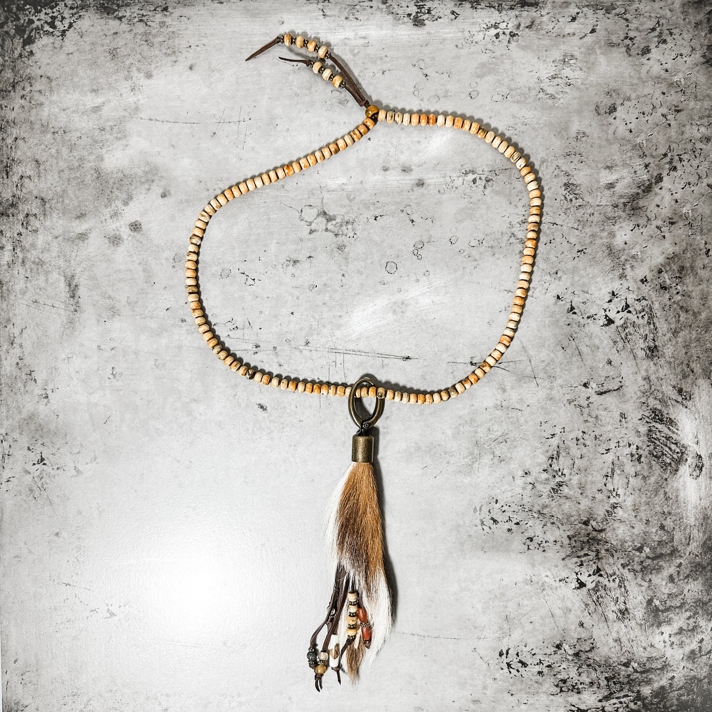 Strand of Bone Beads with Axis Deer Hide Necklace - Amy Kaplan for Bourbon Cowgirl