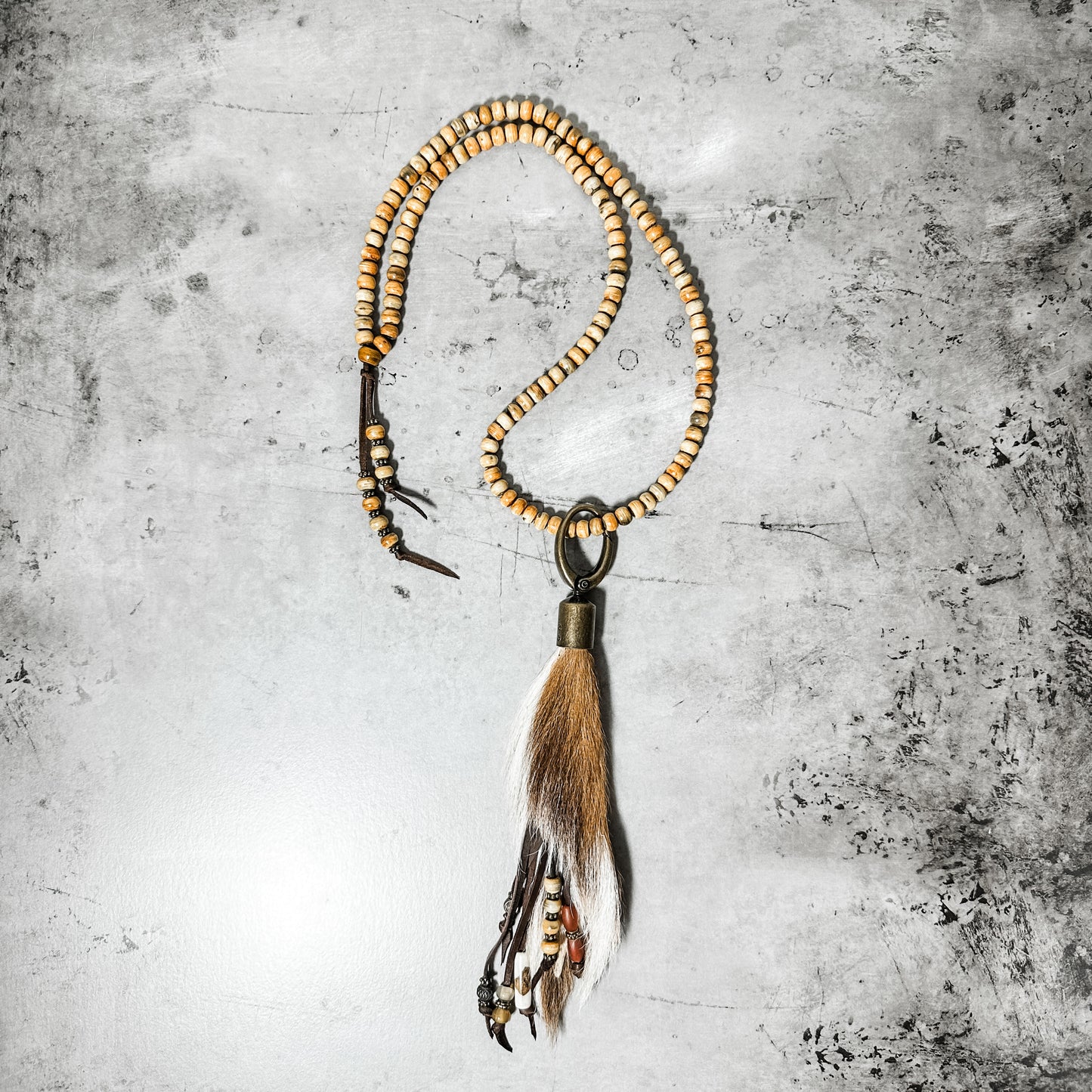 Strand of Bone Beads with Axis Deer Hide Necklace - Amy Kaplan for Bourbon Cowgirl