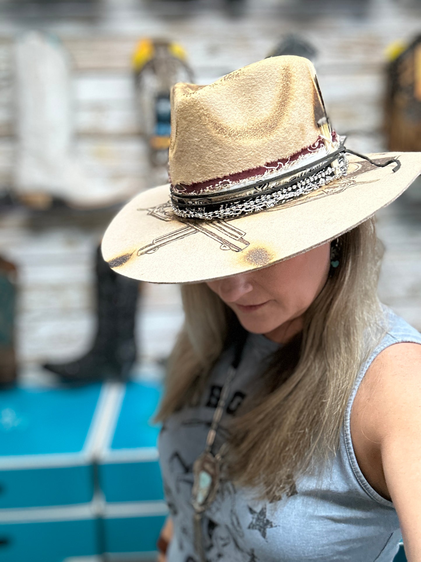 Woman wearing a decorative straw hat.