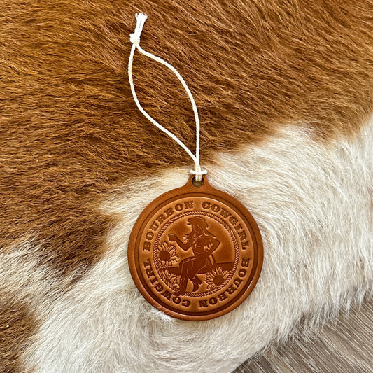 Leather Bourbon Cowgirl medallion on fur.