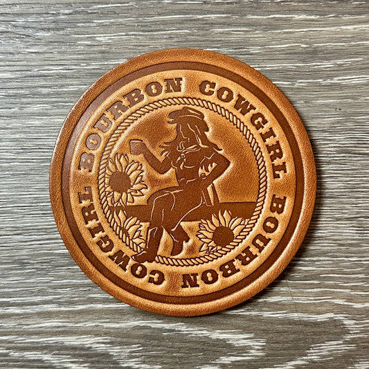 Leather coaster with Bourbon Cowgirl design.