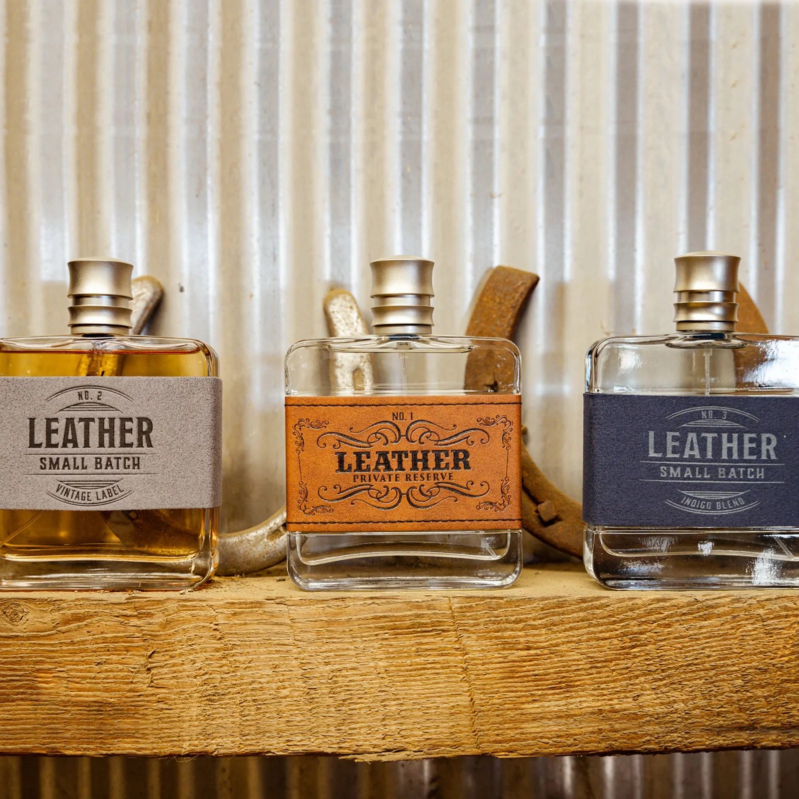 Leather cologne bottles on rustic shelf