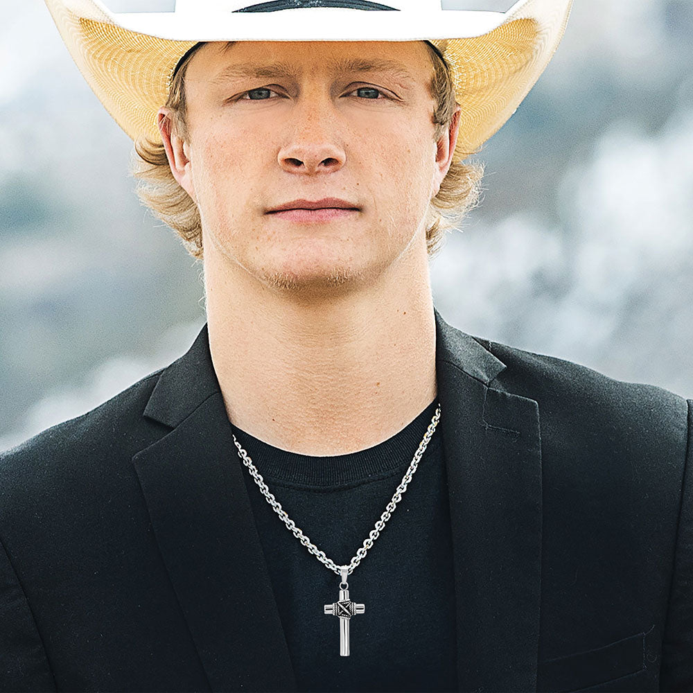 Country singer NC4332_mod wearing cowboy hat and cross necklace.