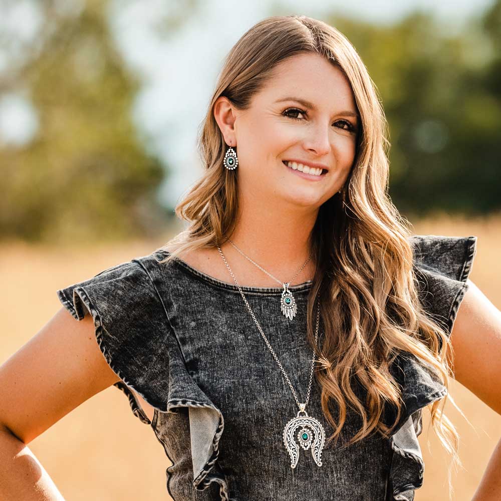 Woman wearing NC5239-mod-3 necklace and earrings