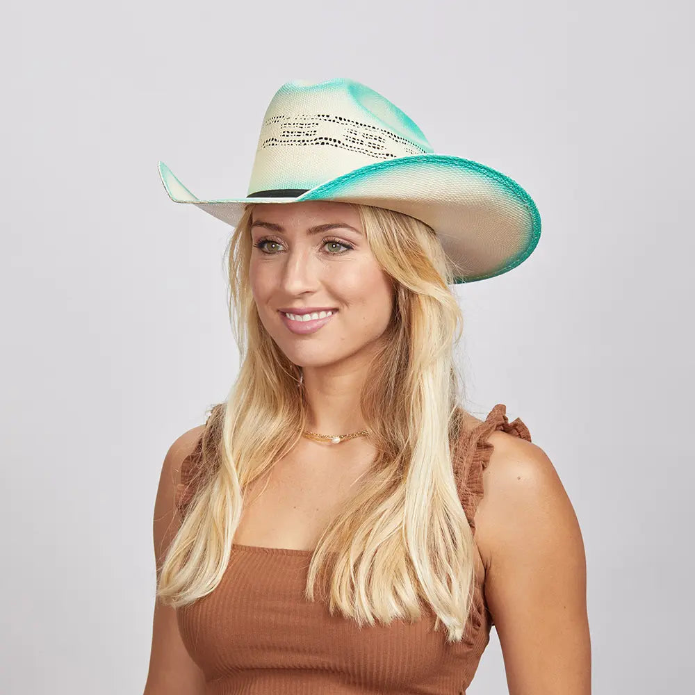 Olivia wearing turquoise straw cowboy hat