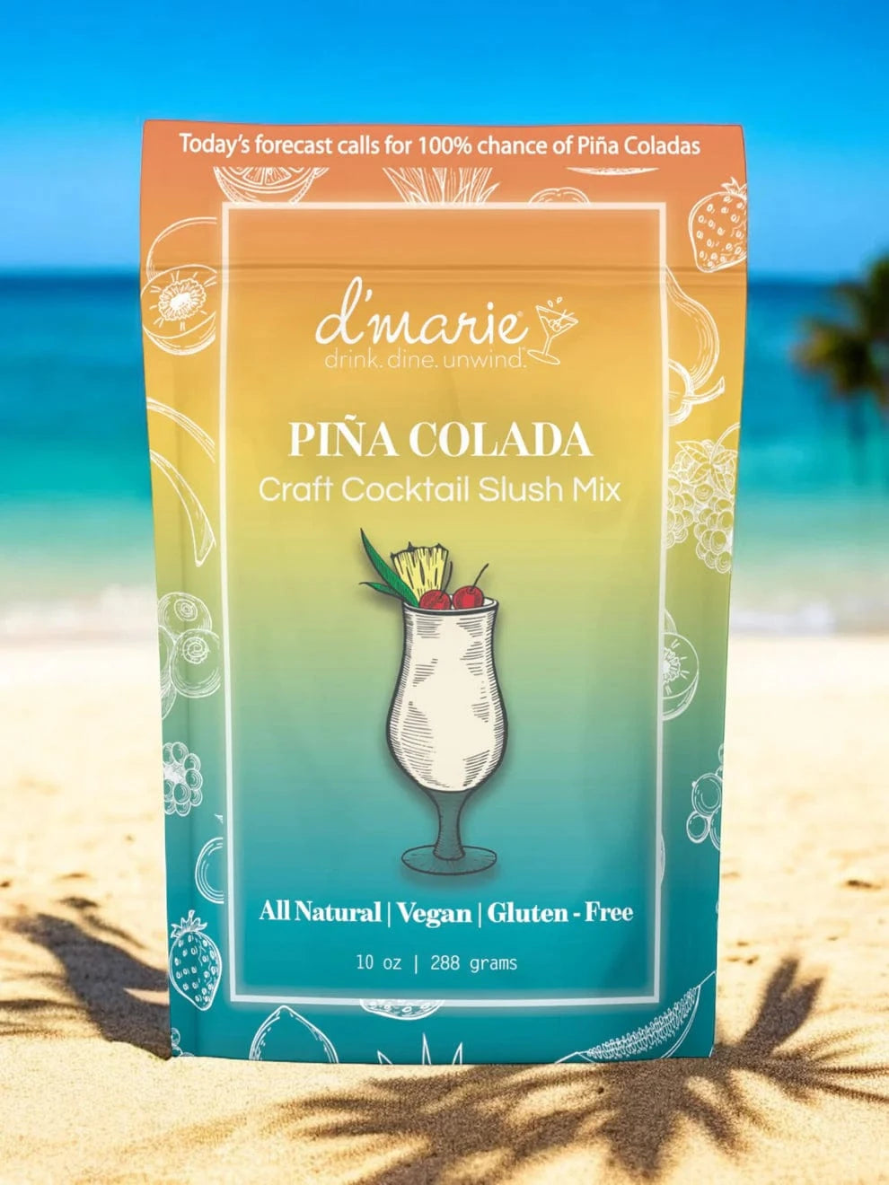 D'Marie Piña Colada Craft Cocktail Slush Mix on beach.