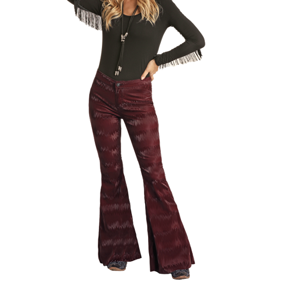 Woman wearing burgundy patterned flare pants