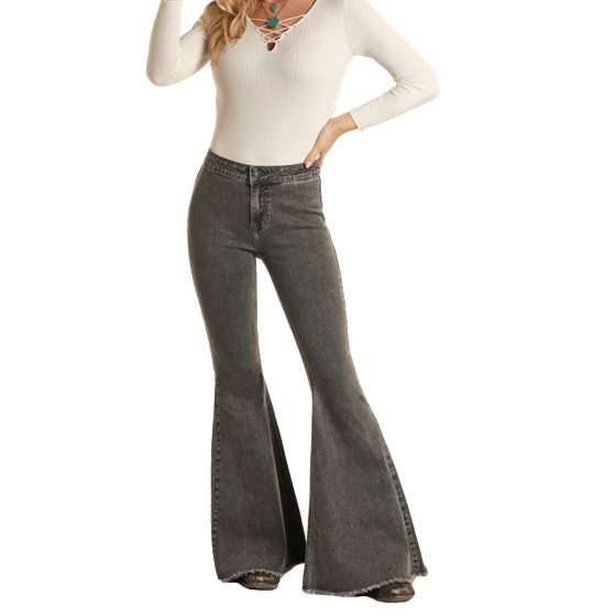 Woman in grey flare jeans