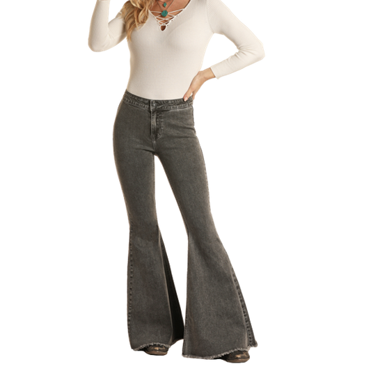Woman in grey flare jeans