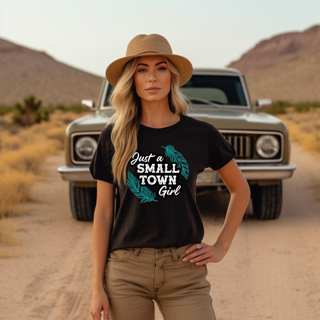 Woman in Small Town Girl tee with vintage truck.
