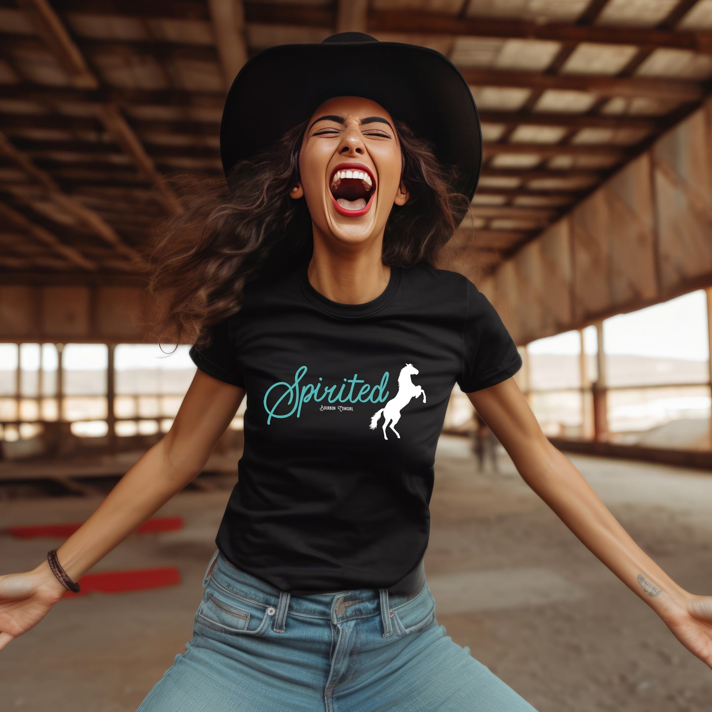 Woman laughing wearing Spirited t-shirt