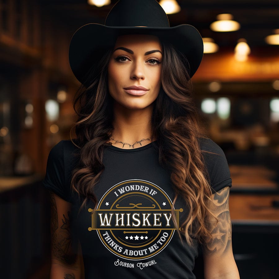 Brunette woman in cowboy hat, Whiskey shirt