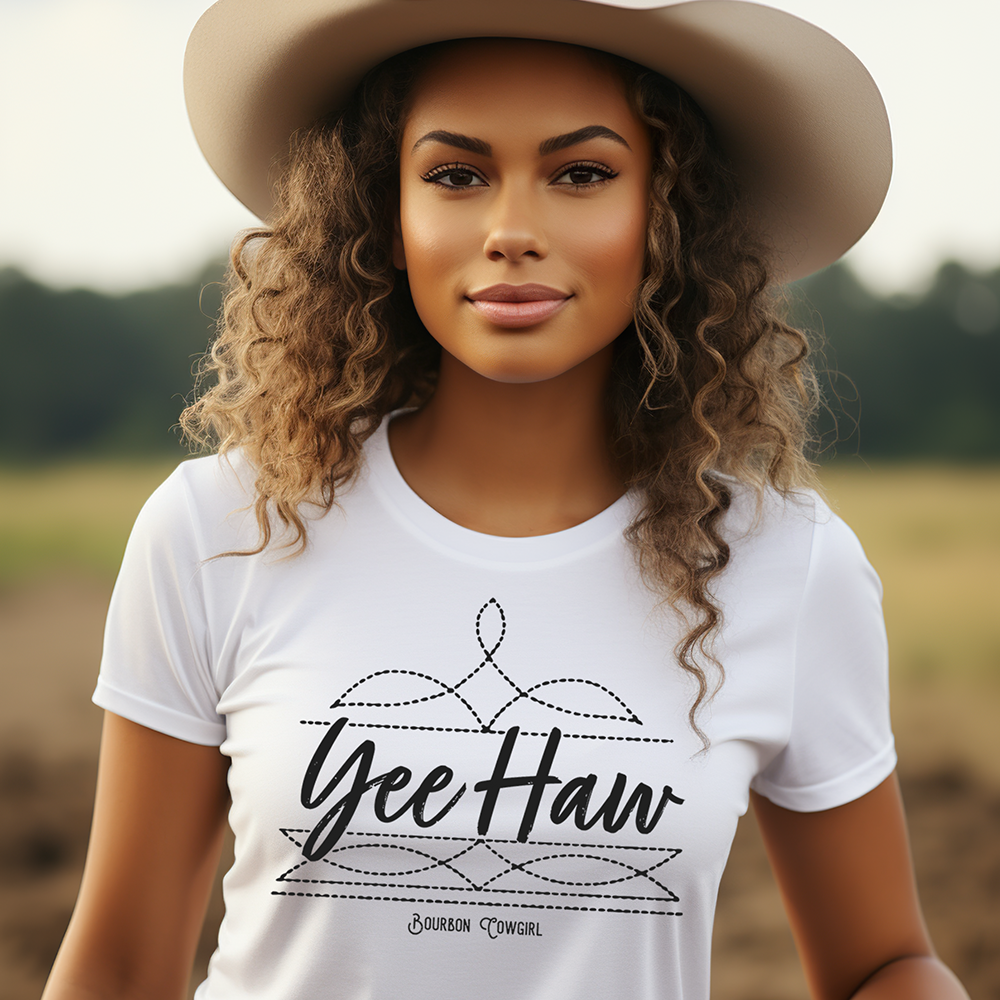 Woman in hat wearing Yee Haw shirt