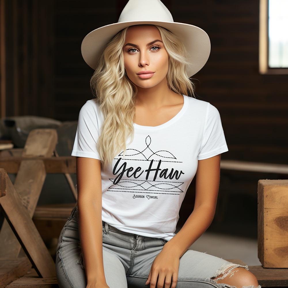 Woman in Yee Haw shirt and cowboy hat