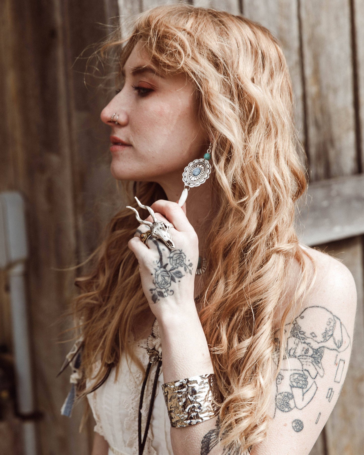 Concho +Coyote Teeth Earrings Lainey Wilson