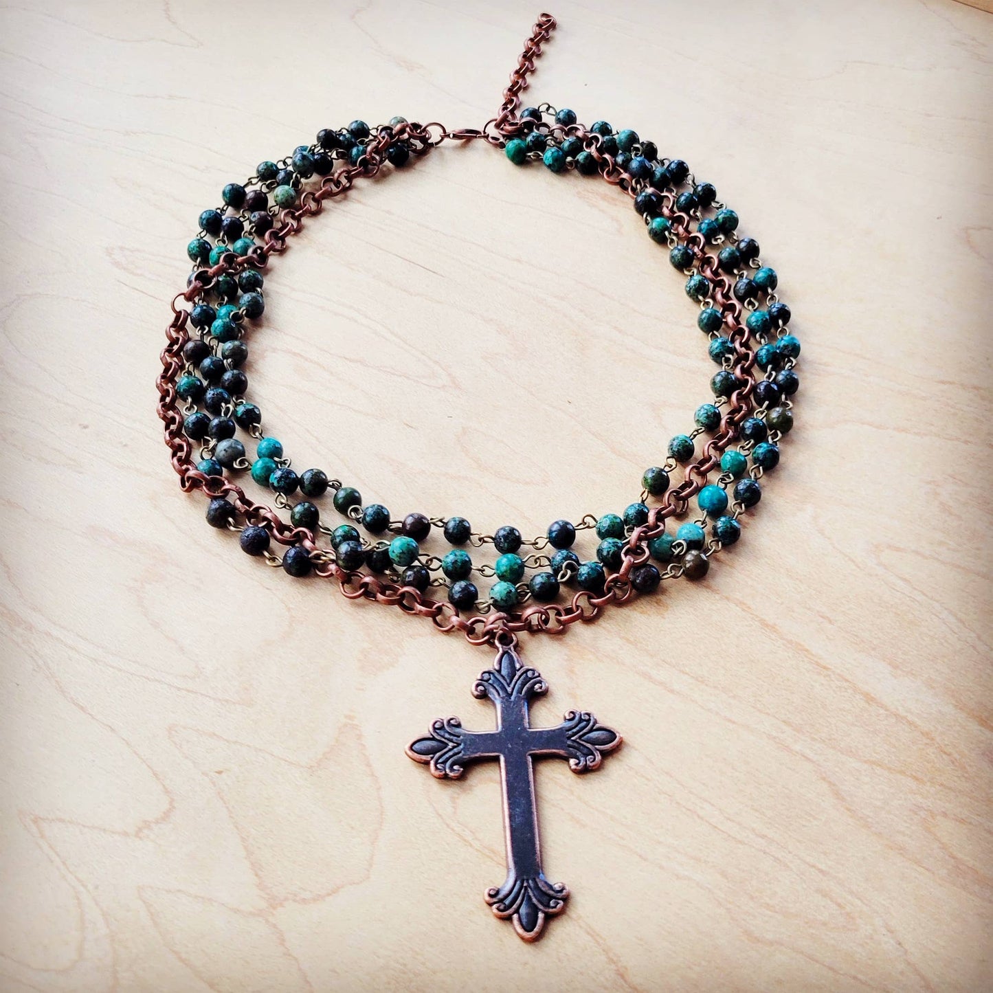 Necklace with a cross pendant.