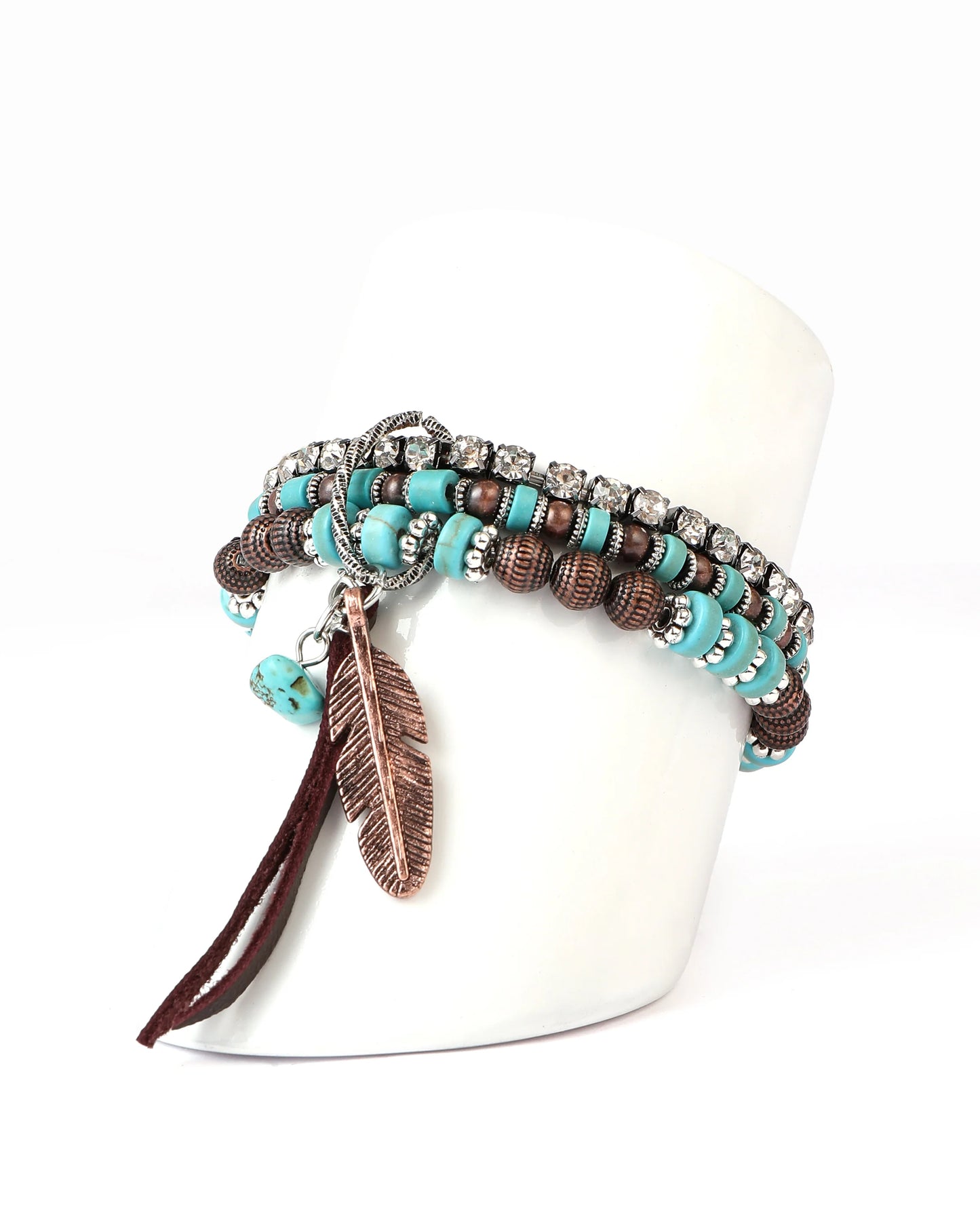 Boho-chic turquoise bracelet with feather charm