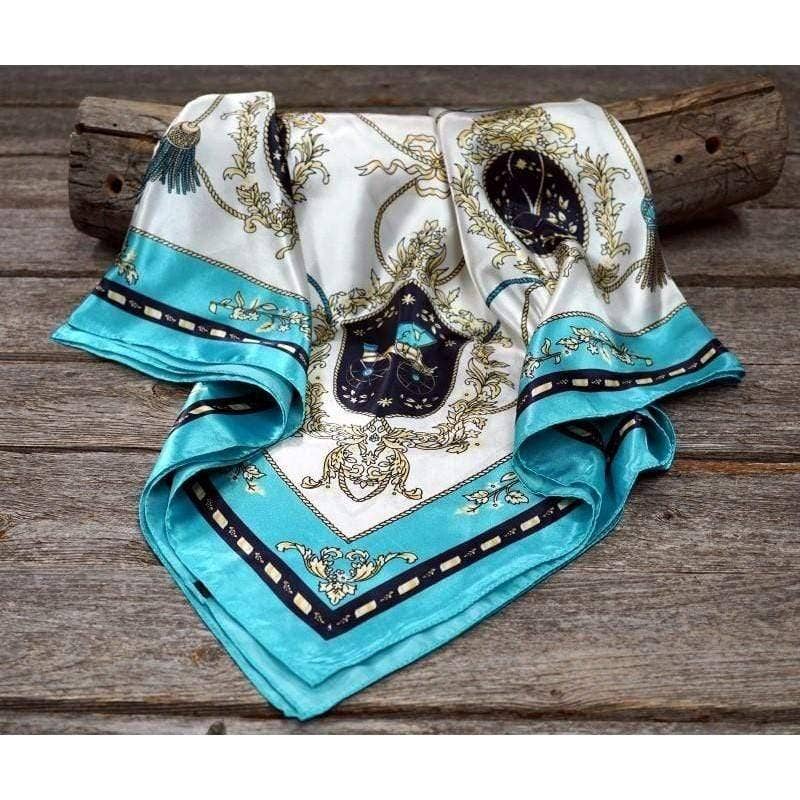 Silk scarf with blue and gold design.
